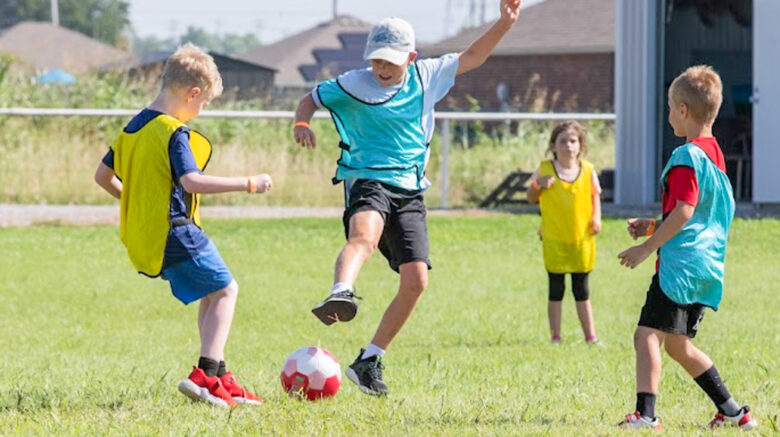 children playing soccer